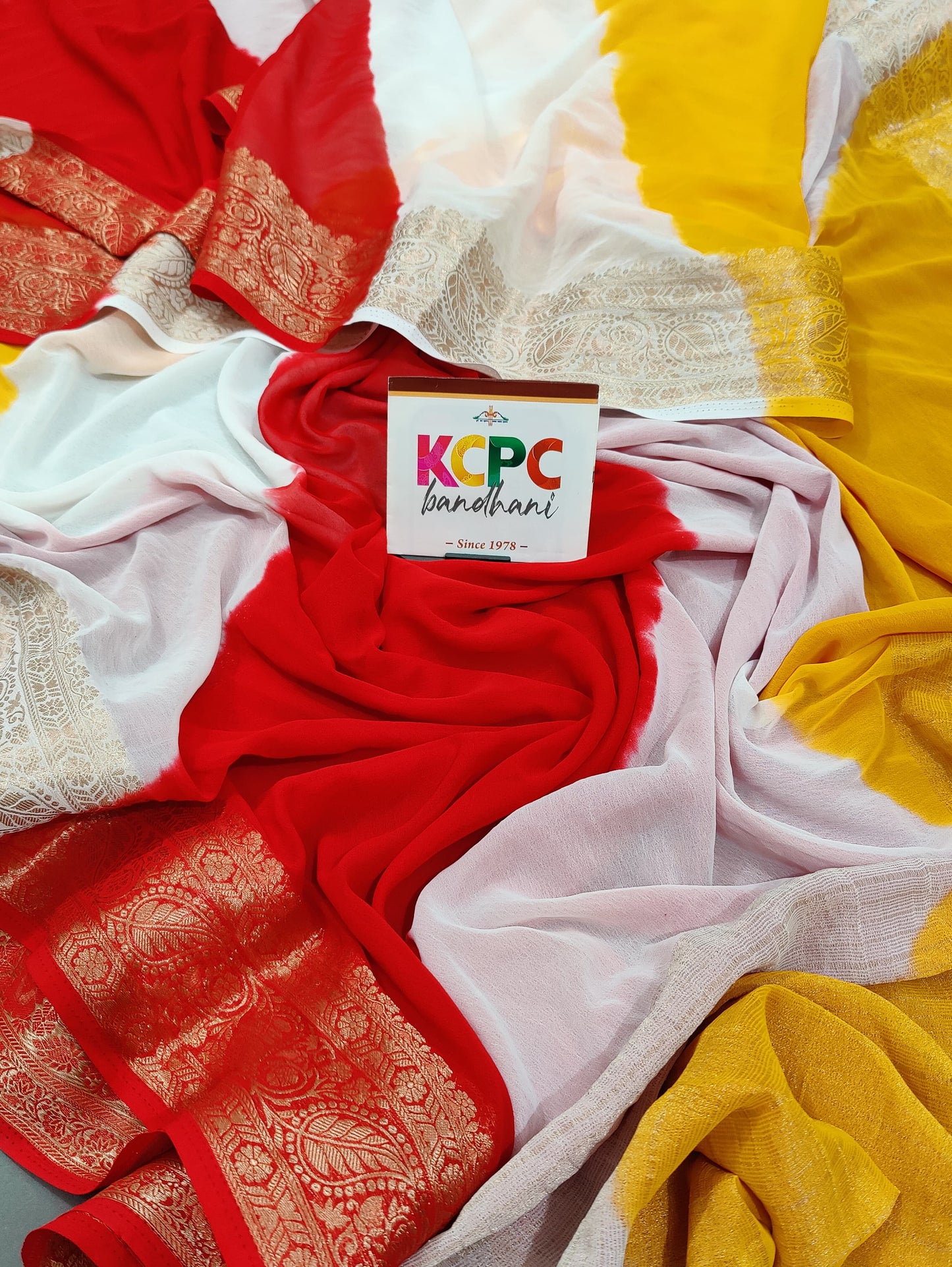 KcPc Lates New Pure Georgette Lahariya Zari Border Saree,JNT