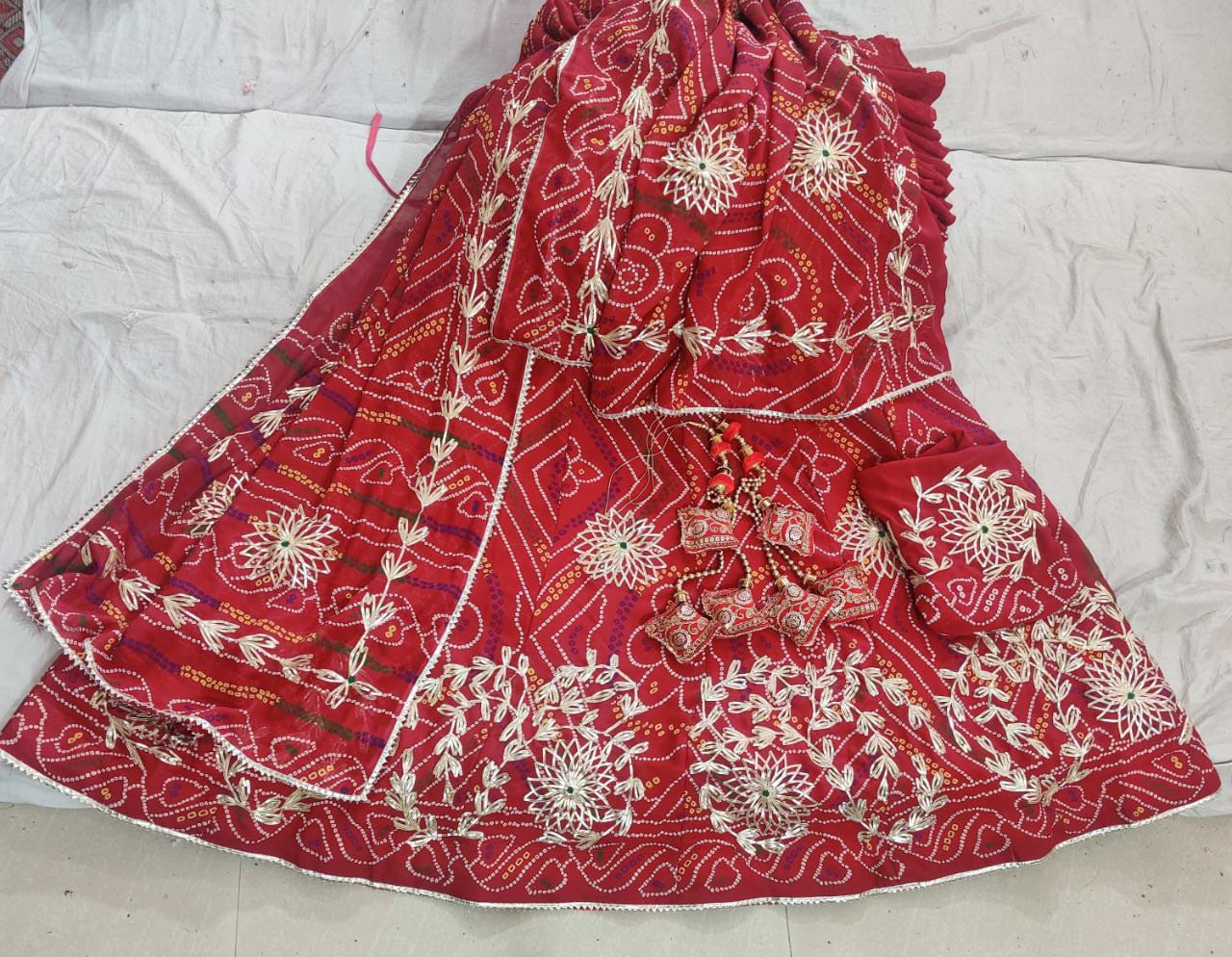 Bandhini chunari print LAHENGA with heavy kachi gotta Patti work with ROLL POLISH full stiched, NR, kml