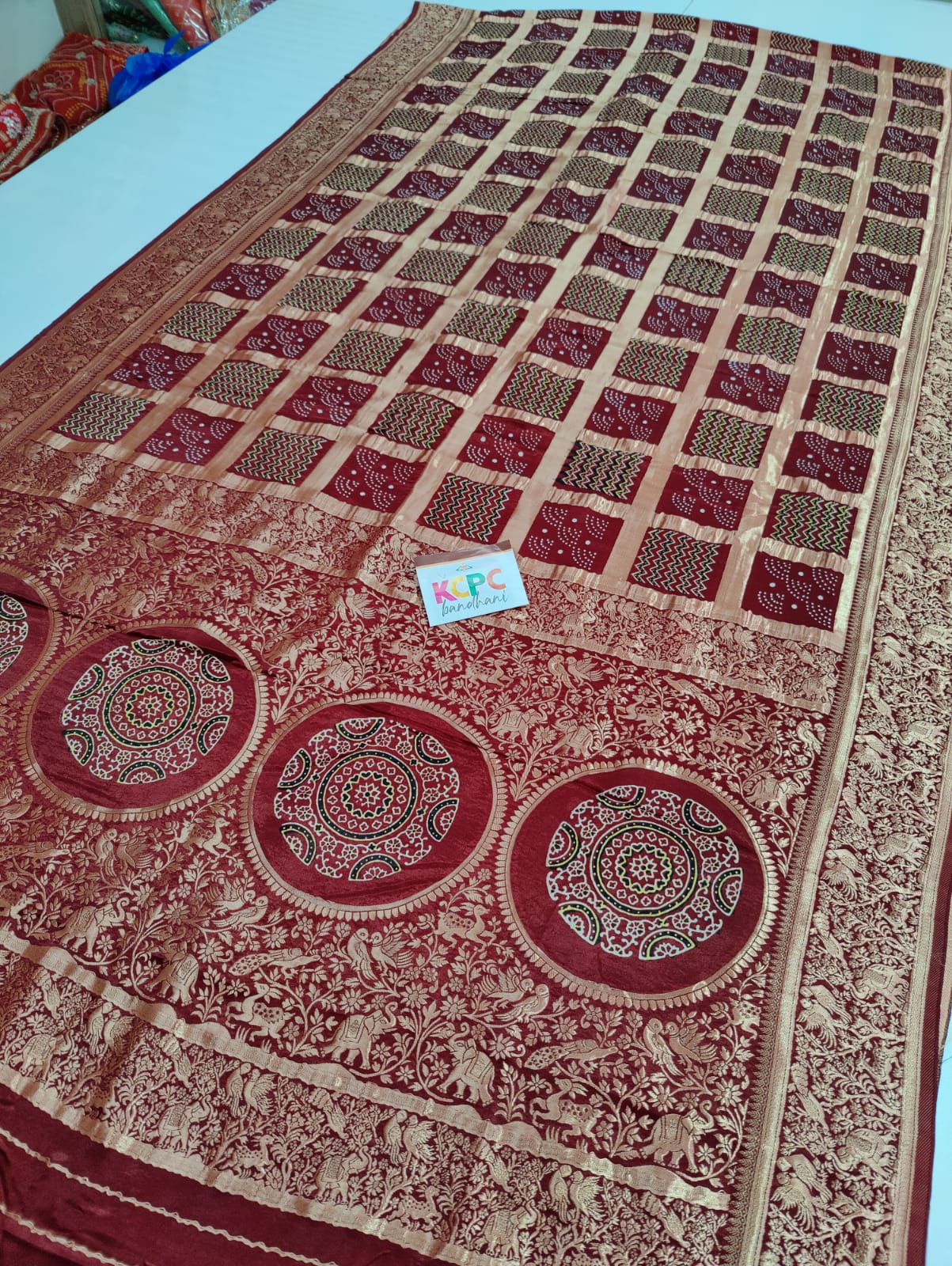 Pure Gaji Silk Ajrakh Bandhani Figure Zari Weaving Saree with Blouse OR kcpc