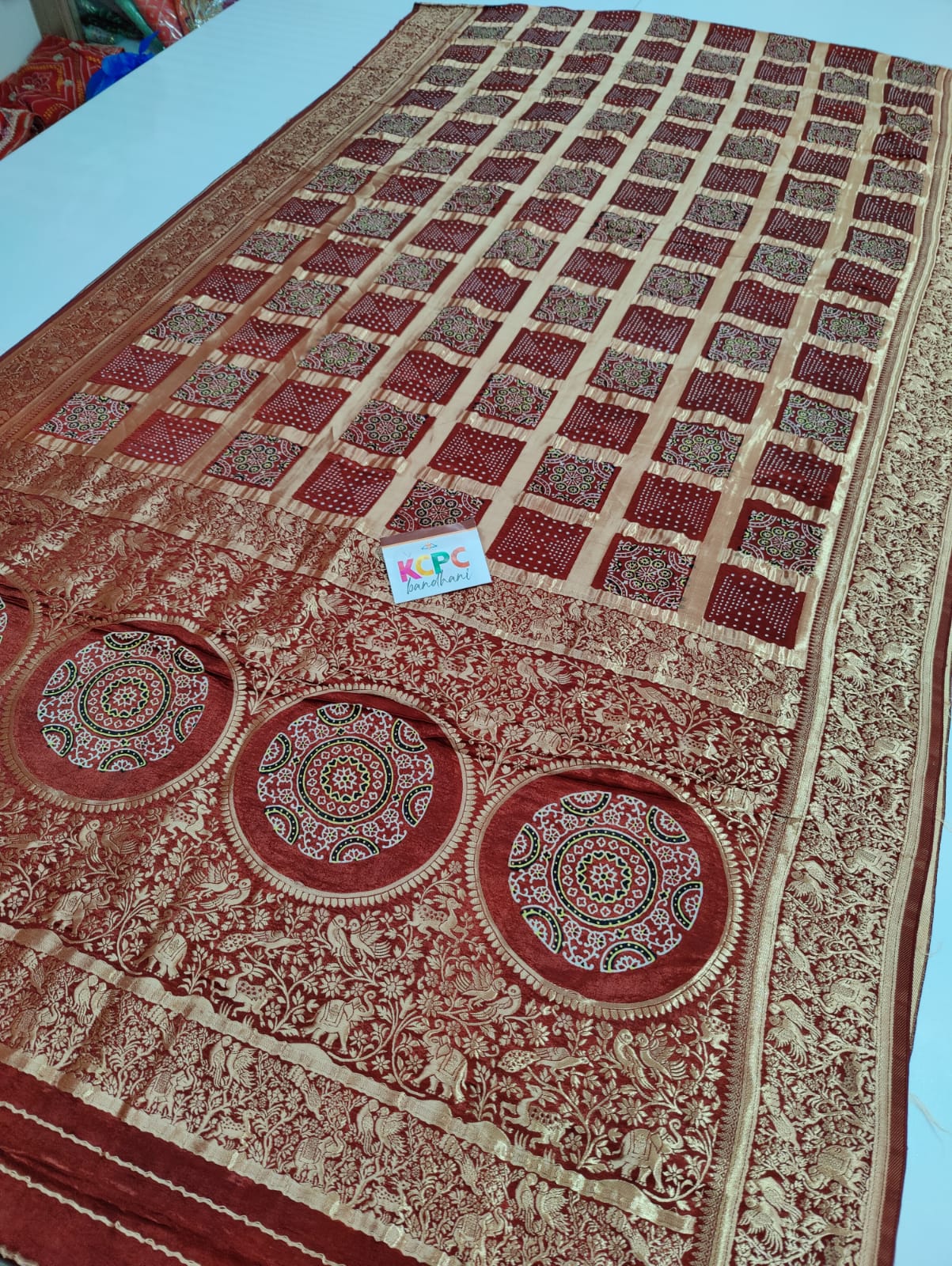 Pure Gaji Silk Ajrakh Bandhani Figure Zari Weaving Saree with Blouse OR kcpc