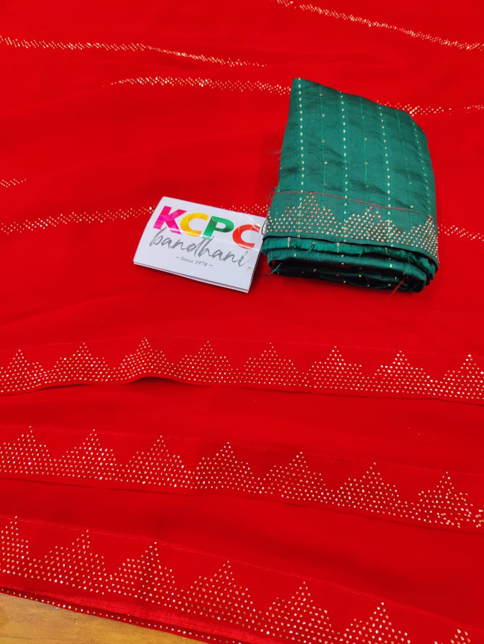 Siroski Diamond Georgette Fabric Saree with contrast blouse