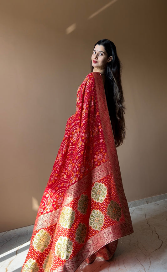 Pure georgette bandhani with zari weaving border saree