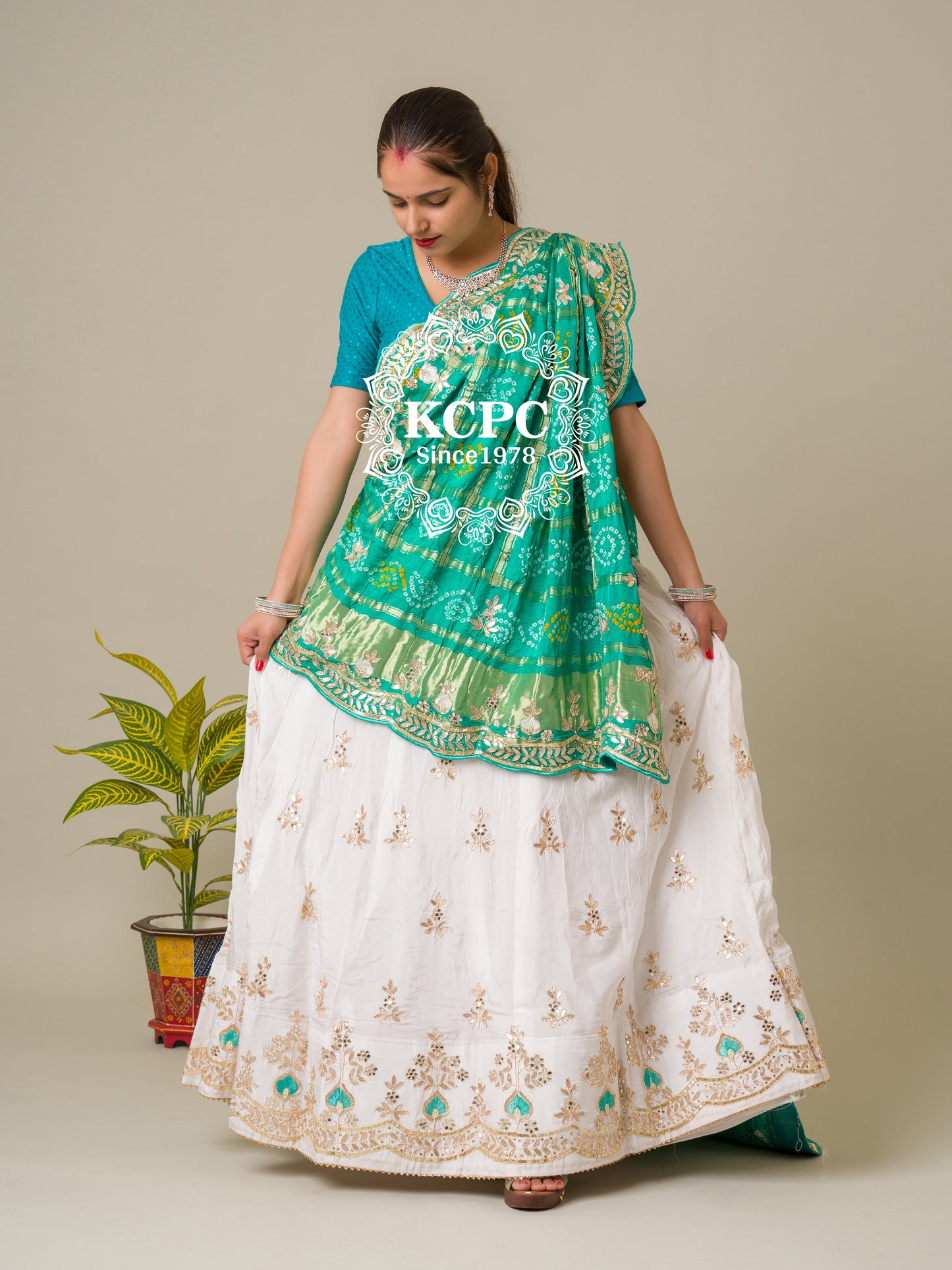 Pure upadasilk lehenga with pure gajji silk dupptta
Gotapatti zardoji moti foil work