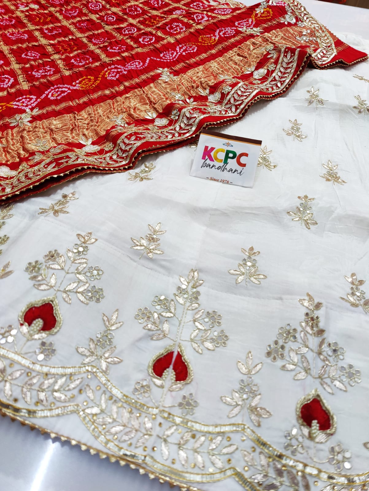 Pure Upadasilk Lehenga With Pure Gajji Silk Dupptta
Gotapatti Zardoji Moti Foil Work Lehenga