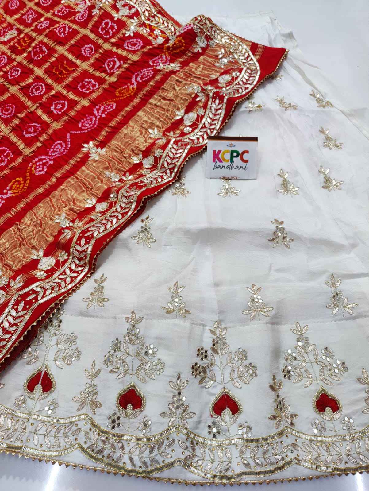 Pure Upadasilk Lehenga With Pure Gajji Silk Dupptta
Gotapatti Zardoji Moti Foil Work Lehenga