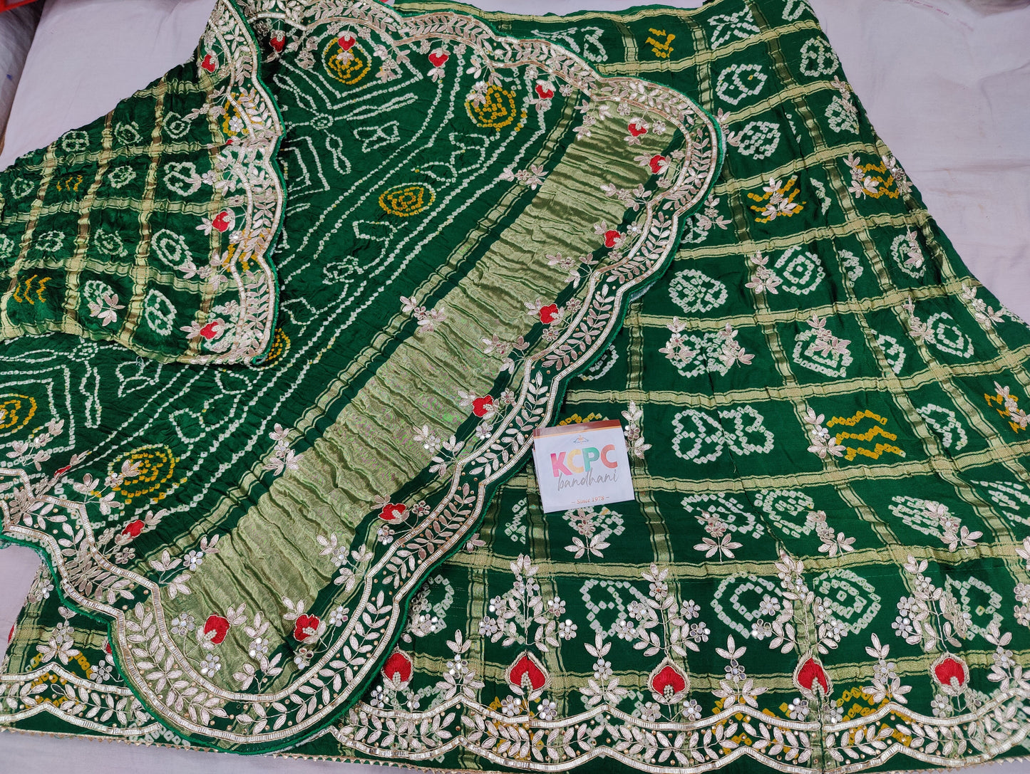 Pure Upadasilk Lehenga With Pure Gajji Silk Dupptta
Gotapatti Zardoji Moti Foil Work Green Lehenga