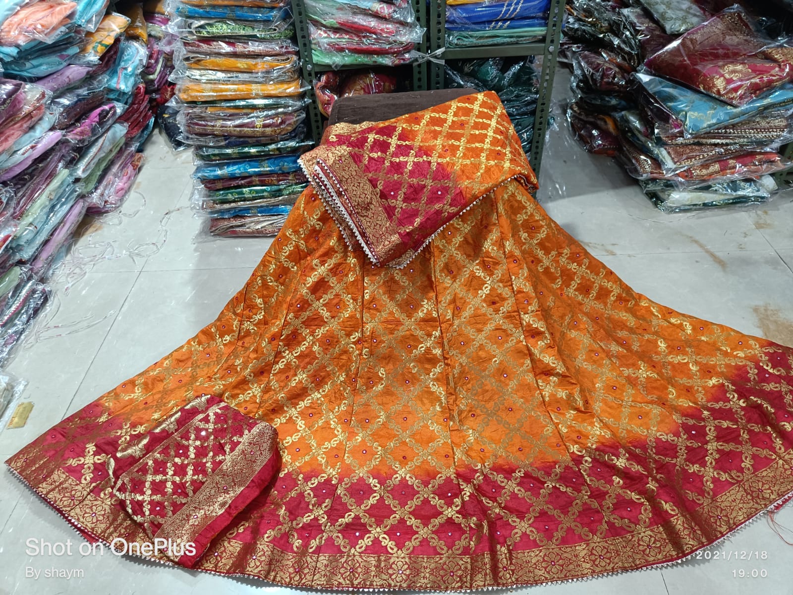 Rajasthani Banarasi Bandhej Ghatchola Mirror Work Lehenga Nr Kml Orange Red Lehenga