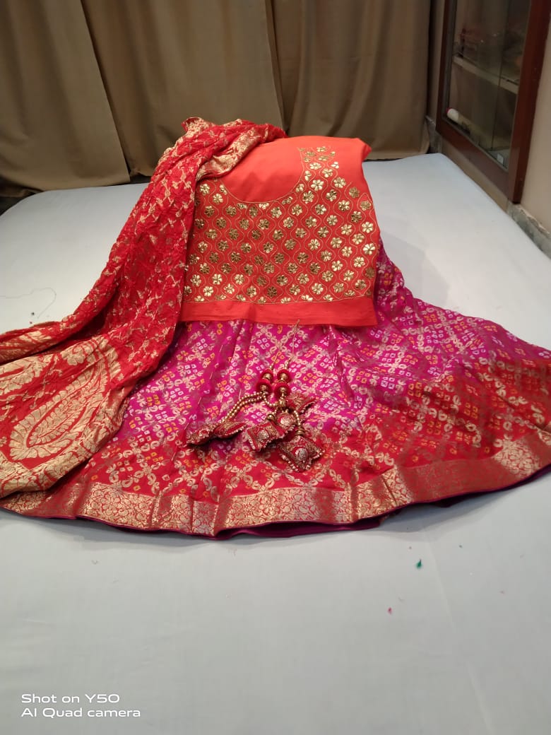 DELIVERY IN 20-25 DAYS) SHADED BANDHEJ LEHENGA EMBELLISHED WITH CUTDA –  Kothari Sons