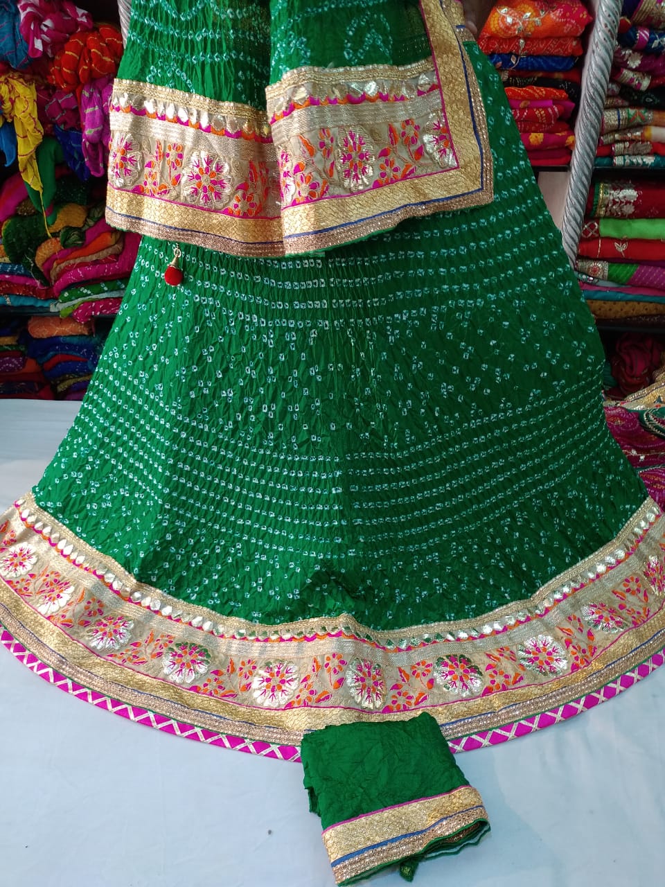 Bandhej Silk Full Stitched Lahnga With Heavy Gotta Patti Border Or Skml Green Lehenga
