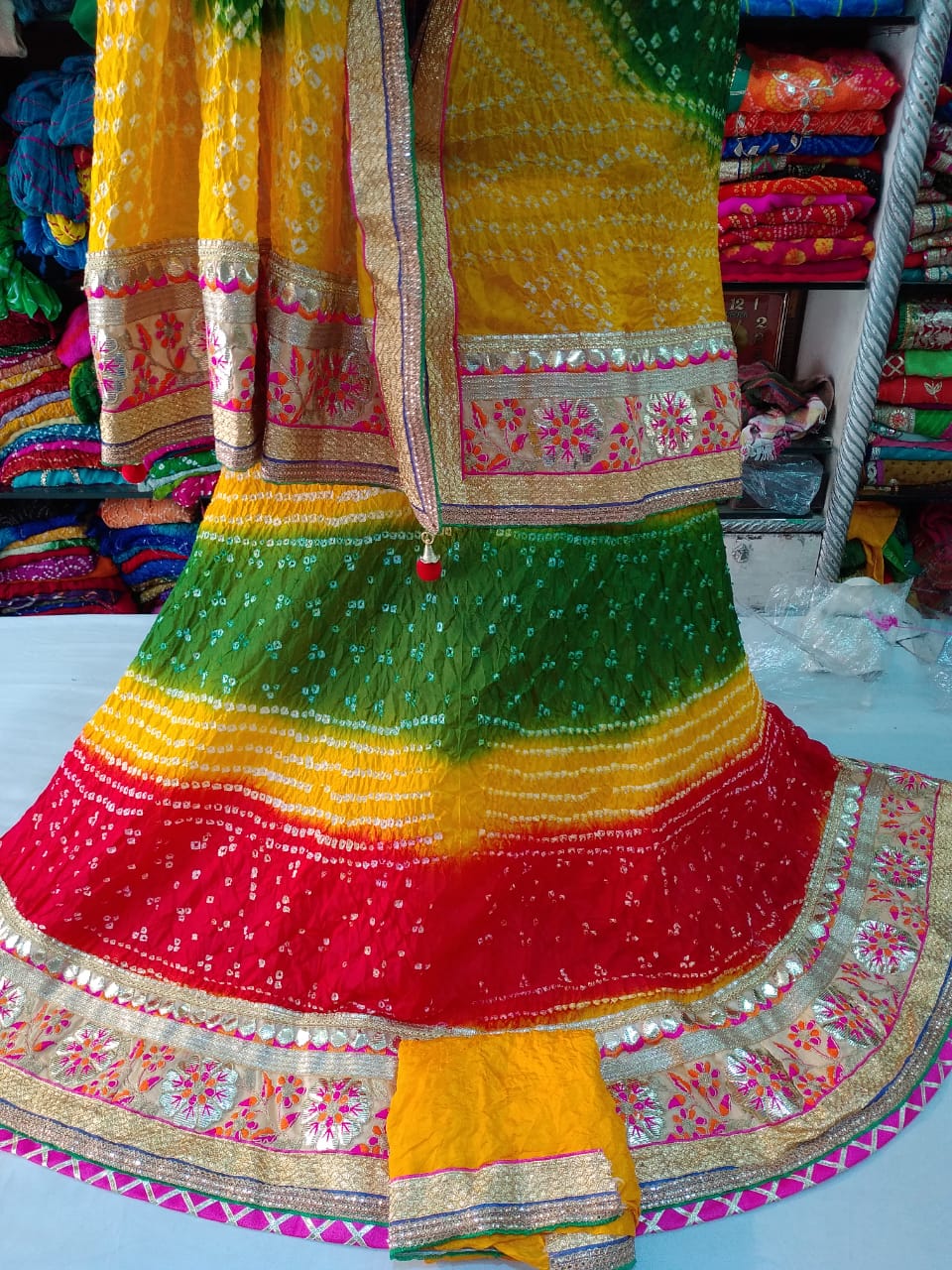 Bandhej silk full stitched lahnga with heavy gotta Patti border, OR, KCPC