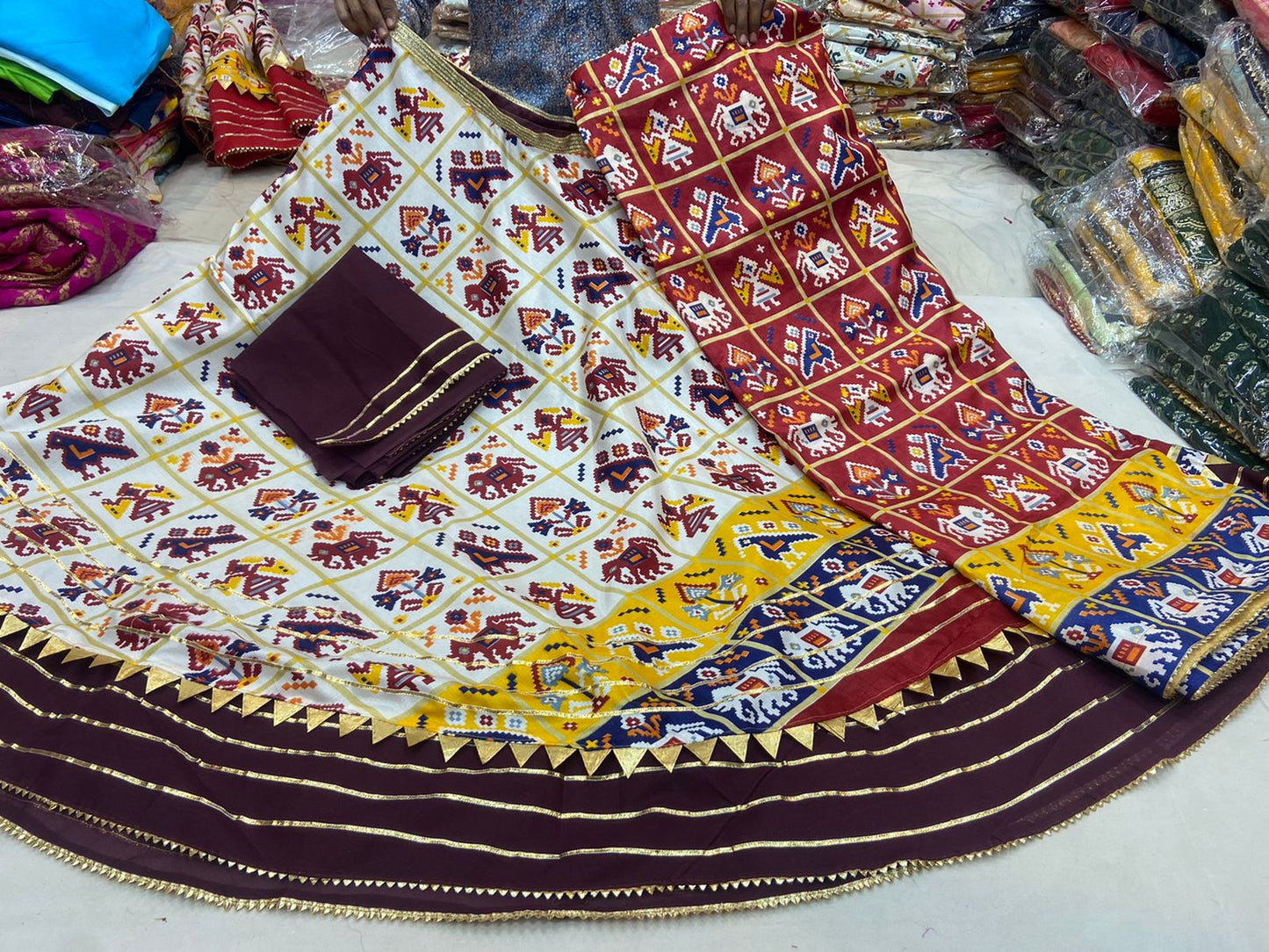 Dola Silk Patola Design With Hathi Ghoda Print Lehenga Kml Nr Cream Wine Lehenga