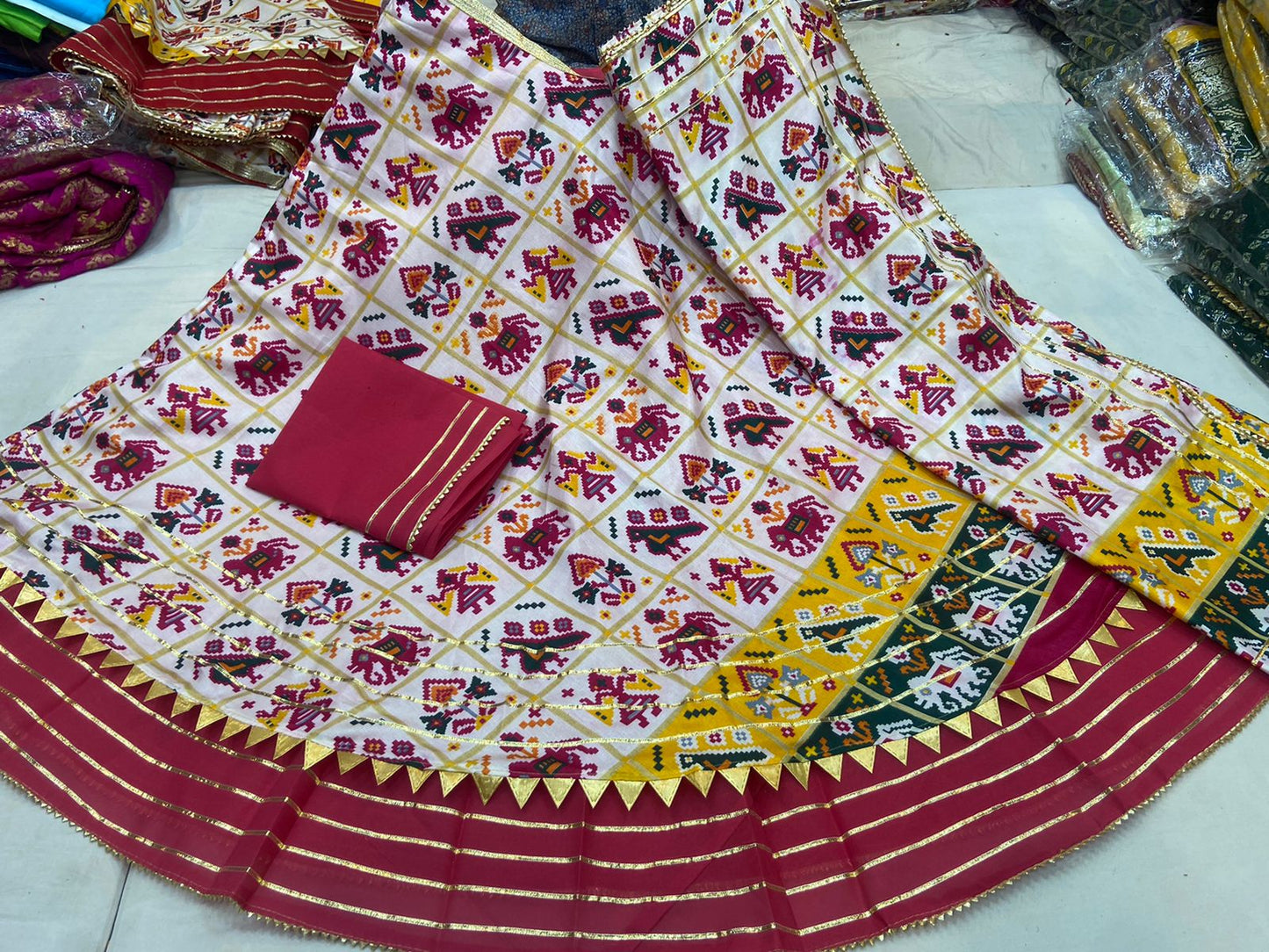 Pure Dola Silk Patola Printed With Gotaptti Work Border Lehenga Kml Or Meherun