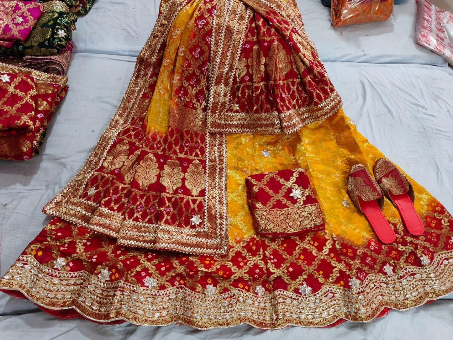 Latest banarasi gharchola silk Banarasi with heavy kachi gotapatti work lehanga