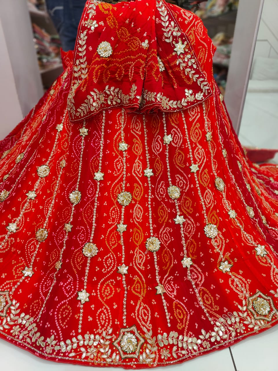 Designer Partywear Bandhani Jaipuri Pure Raidana Lehenga With Pearl Resham Work Nr Satis Red Orange